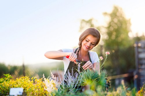 Gardener preparing tools and PPE before starting work